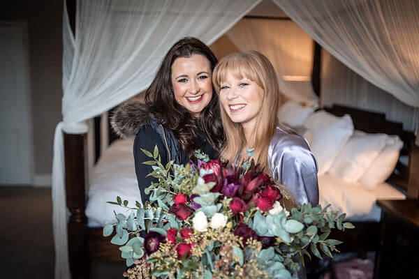 Rachel and Alanagh with custom floral bouquet
